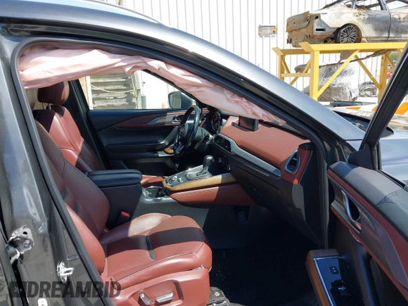 2016 Mazda CX-9 Signature with VIN JM3TCBEY2G0124433, listed as a IAAI auction lot 42194154 with 108,945 mi miles and . Bid and sale history available at DreamBid. Image 5.