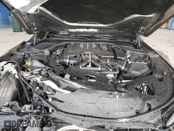 2022 BMW M8 Competition z VIN WBSAE0C00NCH03231, wystawiony jako Copart lot #89316515 z przebiegiem Nie podano mil oraz Nie do naprawy • Non repairable. Historia ofert i sprzedaży dostępna na DreamBid. Obrazek 11.