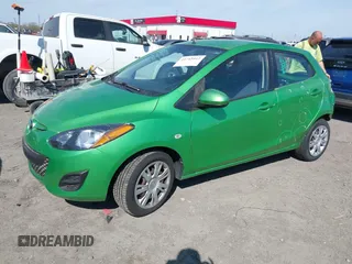 2013 Mazda Mazda2 Sport with VIN JM1DE1KY2D0155604, listed as a IAAI auction lot 41745512 with 150,253 mi miles. Bid and sale history available at carsss.com. Image 2.