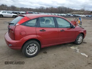 2005 Ford Focus S with VIN 3FAFP37N15R110724, listed as a Copart auction lot 52872255 with 182,925 mi miles and Salvage Title. Bid and sale history available at carsss.com. Image 3.