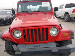 1998 Jeep Wrangler SE with VIN 1J4FY29P2WP791317, listed as a IAAI auction lot 41748523 with 169,052 mi miles. Bid and sale history available at carsss.com. Image 12.