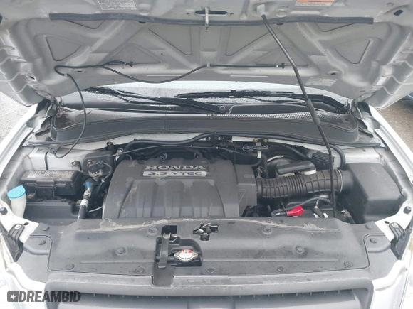 2005 Honda Pilot EX-L with NAVI with VIN 2HKYF18705H560698, listed as a IAAI auction lot 41219235 with 44,448 mi miles. Bid and sale history available at carsss.com. Image 10.