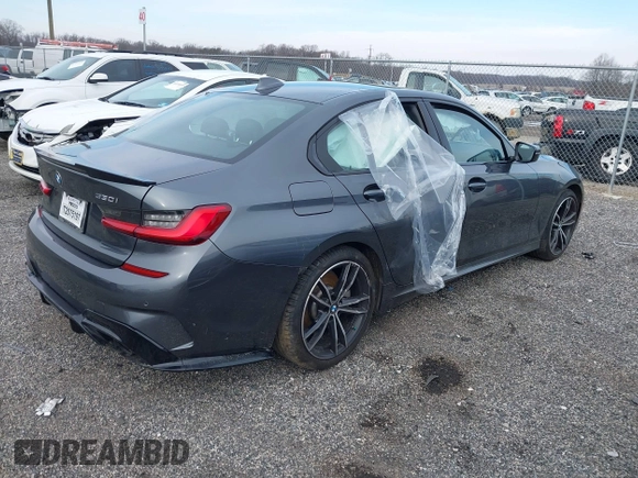 2019 BMW 3 Series 330i xDrive with VIN WBA5R7C54KFH24284, listed as a IAAI auction lot 41246406 with 57,200 mi miles. Bid and sale history available at carsss.com. Image 4.