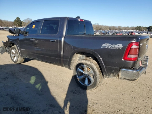 2021 Ram 1500 Laramie with VIN 1C6SRFJTXMN665384, listed as a Copart auction lot 42037685 with 76,836 mi miles and Salvage Title. Bid and sale history available at carsss.com. Image 2.