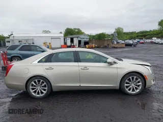 2016 Cadillac XTS Luxury Collection with VIN 2G61N5S39G9142876, listed as a IAAI auction lot 42337302 with 156,510 mi miles and . Bid and sale history available at DreamBid. Image 13.