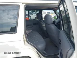 1998 Jeep Cherokee Sport z VIN 1J4FJ68S6WL124839, wystawiony jako IAAI lot #42421174 z przebiegiem 167 762 mil mil oraz . Historia ofert i sprzedaży dostępna na DreamBid. Obrazek 8.