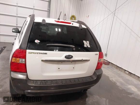 2007 Kia Sportage LX with VIN KNDJF724877399530, listed as a IAAI auction lot 41696698 with 124,967 mi miles. Bid and sale history available at carsss.com. Image 16.