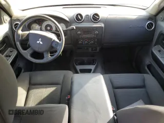 2006 Mitsubishi Raider z VIN 1Z7HT38K76S574856, wystawiony jako Copart lot #74367324 z przebiegiem 176 611 mil mil oraz Czysty tytuł • Clean title. Historia ofert i sprzedaży dostępna na DreamBid. Obrazek 8.