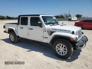 2023 Jeep Gladiator Freedom with VIN 1C6HJTAG1PL585720, listed as a Copart auction lot 47386855 with 14,525 mi miles and Salvage title. Bid and sale history available at DreamBid. Image 4.