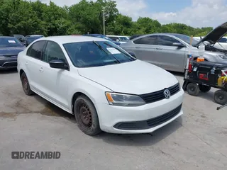 2014 Volkswagen Jetta S z VIN 3VW2K7AJ0EM376038, wystawiony jako IAAI lot #42387397 z przebiegiem 161 261 mil mil oraz . Historia ofert i sprzedaży dostępna na DreamBid. Obrazek 1.