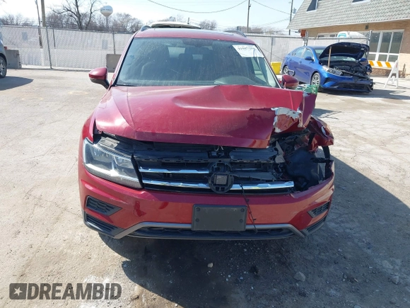 2019 Volkswagen Tiguan SE with VIN 3VV3B7AX3KM130075, listed as a IAAI auction lot 41807584 with 57,308 mi miles and . Bid and sale history available at DreamBid. Image 12.