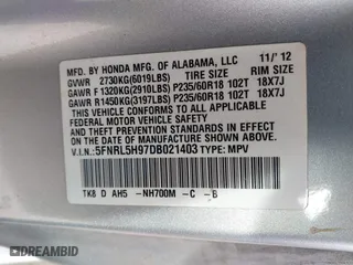 2013 Honda Odyssey Touring with VIN 5FNRL5H97DB021403, listed as a IAAI auction lot 41606606 with 223,547 mi miles. Bid and sale history available at carsss.com. Image 9.