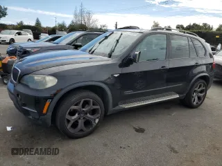 2011 BMW X5 35i z VIN 5UXZV4C59BL741822, wystawiony jako Copart lot #47702585 z przebiegiem 199 314 mil mil oraz Czysty tytuł • Clean title. Historia ofert i sprzedaży dostępna na DreamBid. Obrazek 1.