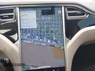 2014 Tesla Model S 60 with VIN 5YJSA1H12EFP39582, listed as a IAAI auction lot 42545143 with 117,383 mi miles and . Bid and sale history available at DreamBid. Image 18.
