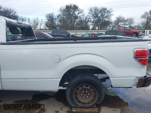 2009 Ford F-150 XL with VIN 1FTRF12W49KB49249, listed as a IAAI auction lot 41113915 with 193,285 mi miles and . Bid and sale history available at DreamBid. Image 13.