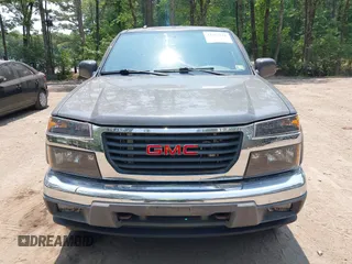 2012 GMC Canyon SLE2 z VIN 1GTJ6PFE2C8128602, wystawiony jako IAAI lot #42421110 z przebiegiem 79 273 mil mil oraz . Historia ofert i sprzedaży dostępna na DreamBid. Obrazek 12.