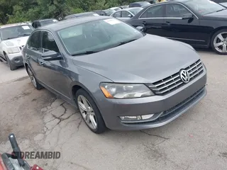 2014 Volkswagen Passat SEL Premium with VIN 1VWCN7A39EC070616, listed as a IAAI auction lot 42668136 with 187,168 mi miles and . Bid and sale history available at DreamBid. Image 1.
