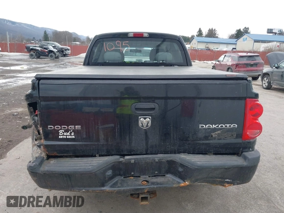 2011 Ram Dakota Bighorn/Lonestar with VIN 1D7RW3GK6BS611095, listed as a IAAI auction lot 41433067 with 137,638 mi miles. Bid and sale history available at carsss.com. Image 16.