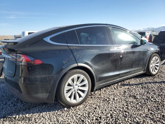 2019 Tesla Model X 75D with VIN 5YJXCAE24KF188385, listed as a Copart auction lot 48063375 with 0 mi miles and Salvage Title. Bid and sale history available at carsss.com. Image 3.