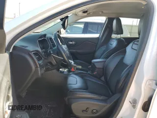 2019 Jeep Cherokee Trailhawk with VIN 1C4PJMBX7KD336494, listed as a Copart auction lot 50346545 with 69,994 mi miles and Salvage Title. Bid and sale history available at DreamBid. Image 7.