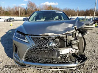 2020 Lexus RX with VIN 2T2AZMAA9LC180643, listed as a Copart auction lot 84567984 with 36,025 mi miles and Salvage Title. Bid and sale history available at carsss.com. Image 5.