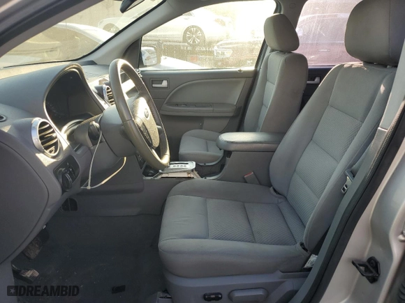 2007 Ford Freestyle SEL with VIN 1FMDK02177GA39019, listed as a Copart auction lot 73844164 with 185,083 mi miles and Salvage Title. Bid and sale history available at carsss.com. Image 7.