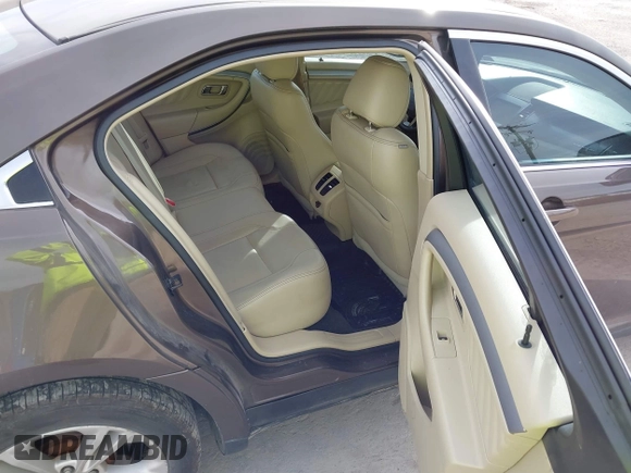 2015 Ford Taurus SEL with VIN 1FAHP2H87FG199865, listed as a IAAI auction lot 40760225 with 77,782 mi miles. Bid and sale history available at carsss.com. Image 8.