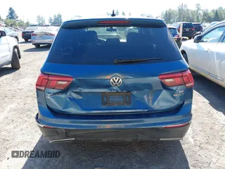 2018 Volkswagen Tiguan SEL z VIN 3VV2B7AX0JM084232, wystawiony jako IAAI lot #42726306 z przebiegiem 97 624 mil mil oraz . Historia ofert i sprzedaży dostępna na DreamBid. Obrazek 16.