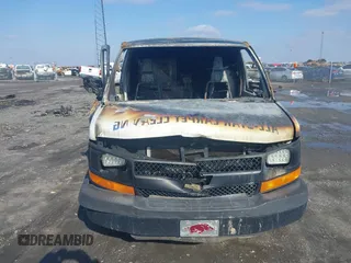 2014 Chevrolet Express Cargo Van with VIN 1GCWGGBA3E1214227, listed as a IAAI auction lot 41571911 with 1 mi miles. Bid and sale history available at carsss.com. Image 11.