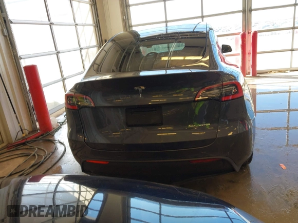 2021 Tesla Model Y Long Range with VIN 5YJYGDEE2MF087871, listed as a IAAI auction lot 41370004 with 85,757 mi miles. Bid and sale history available at carsss.com. Image 16.