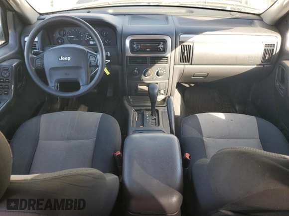 2004 Jeep Grand Cherokee with VIN 1J4GX48JX4C301369, listed as a Copart auction lot 77803094 with 179,404 mi miles and Clean title. Bid and sale history available at DreamBid. Image 8.