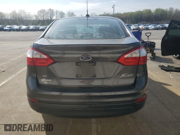 2019 Ford Fiesta SE z VIN 3FADP4BJ5KM146863, wystawiony jako Copart lot #52404965 z przebiegiem 61 286 mil mil oraz Szkoda całkowita • Salvage title. Historia ofert i sprzedaży dostępna na DreamBid. Obrazek 6.