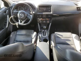 2015 Mazda CX-5 Grand Touring with VIN JM3KE4DY5F0460465, listed as a Copart auction lot 46392605 with 103,185 mi miles and Salvage Title. Bid and sale history available at carsss.com. Image 8.