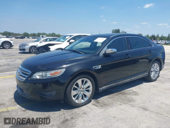 2010 Ford Taurus Limited with VIN 1FAHP2FW4AG151640, listed as a IAAI auction lot 42049305 with 135,769 mi miles. Bid and sale history available at carsss.com. Image 2.