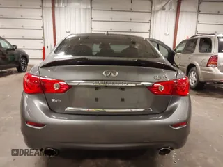2014 Infiniti Q50 Premium with VIN JN1BV7ARXEM699902, listed as a IAAI auction lot 42135410 with 103,929 mi miles and . Bid and sale history available at DreamBid. Image 17.