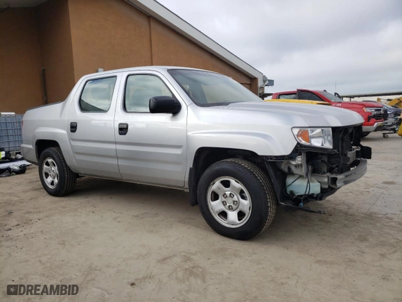 2010 Honda Ridgeline RT with VIN 5FPYK1F25AB013221, listed as a Copart auction lot 66996454 with 54,390 mi miles and Salvage Title. Bid and sale history available at carsss.com. Image 4.
