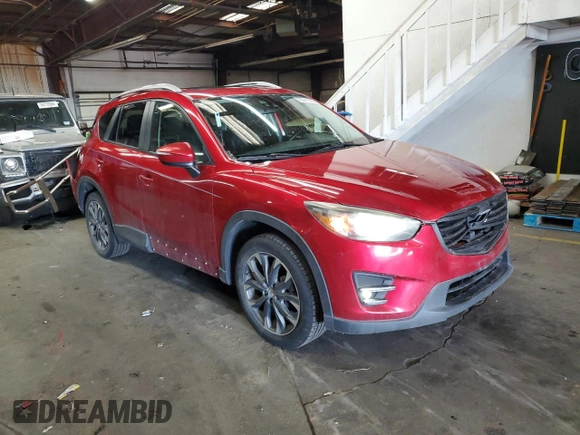 2016 Mazda CX-5 Grand Touring with VIN JM3KE4DY1G0669316, listed as a Copart auction lot 79961554 with 117,454 mi miles and Salvage Title. Bid and sale history available at carsss.com. Image 4.