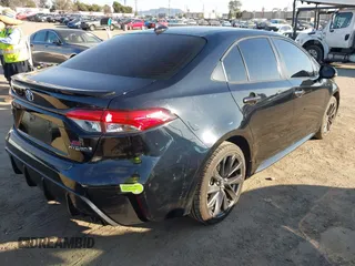 2023 Toyota Corolla Hybrid LE with VIN JTDBCMFE4P3015622, listed as a IAAI auction lot 41644340 with 66,099 mi miles. Bid and sale history available at carsss.com. Image 4.