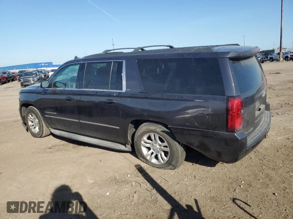 2015 Chevrolet Suburban LT z VIN 1GNSKJKC2FR508045, wystawiony jako Copart lot #56676985 z przebiegiem 120 436 mil mil oraz Szkoda całkowita • Salvage title. Historia ofert i sprzedaży dostępna na DreamBid. Obrazek 2.