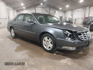 2010 Cadillac DTS w/1SC with VIN 1G6KD5EY7AU125289, listed as a IAAI auction lot 41836355 with 135,784 mi miles. Bid and sale history available at carsss.com. Image 1.