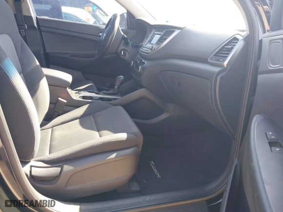2017 Hyundai Tucson Value with VIN KM8J33A28HU302472, listed as a IAAI auction lot 41717598 with 126,438 mi miles. Bid and sale history available at carsss.com. Image 5.