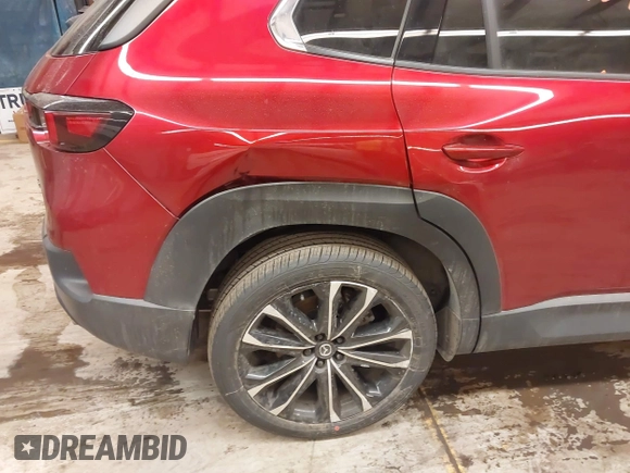 2023 Mazda CX-50 S Premium Plus with VIN 7MMVABEM8PN105411, listed as a IAAI auction lot 41378915 with 34,866 mi miles and . Bid and sale history available at DreamBid. Image 19.