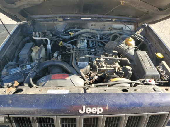 1998 Jeep Cherokee Sport with VIN 1J4FT68S5WL136989, listed as a Copart auction lot 81035084 with 140,848 mi miles and Salvage Title. Bid and sale history available at carsss.com. Image 13.