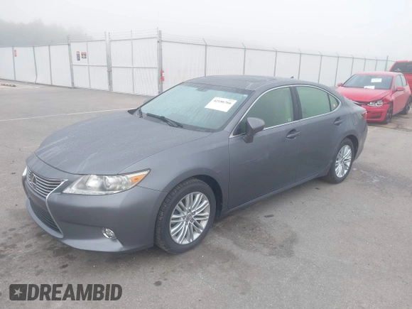 2014 Lexus ES 330 z VIN JTHBK1GGXE2148484, wystawiony jako IAAI lot #42186766 z przebiegiem 117 217 mil mil oraz . Historia ofert i sprzedaży dostępna na DreamBid. Obrazek 2.