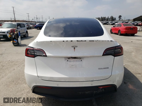 2022 Tesla Model Y Performance with VIN 7SAYGDEF6NF493231, listed as a Copart auction lot 52336284 with 37,116 mi miles and Salvage title. Bid and sale history available at DreamBid. Image 6.