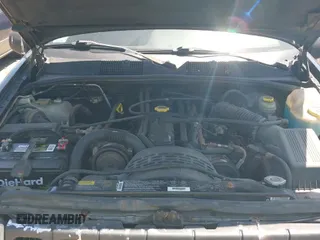 1997 Jeep Grand Cherokee Laredo z VIN 1J4GZ58S3VC508194, wystawiony jako IAAI lot #42578622 z przebiegiem 146 559 mil mil oraz . Historia ofert i sprzedaży dostępna na DreamBid. Obrazek 13.