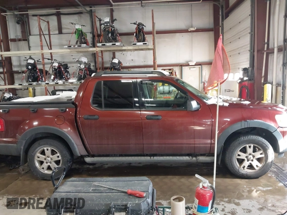 2009 Ford Explorer Sport Trac XLT with VIN 1FMEU51E69UA40991, listed as a IAAI auction lot 41651836 with 189,752 mi miles and . Bid and sale history available at DreamBid. Image 13.