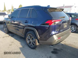 2024 Toyota RAV4 Hybrid XLE Premium with VIN JTMB6RFV0RD141316, listed as a IAAI auction lot 41980384 with 13,270 mi miles and . Bid and sale history available at DreamBid. Image 3.