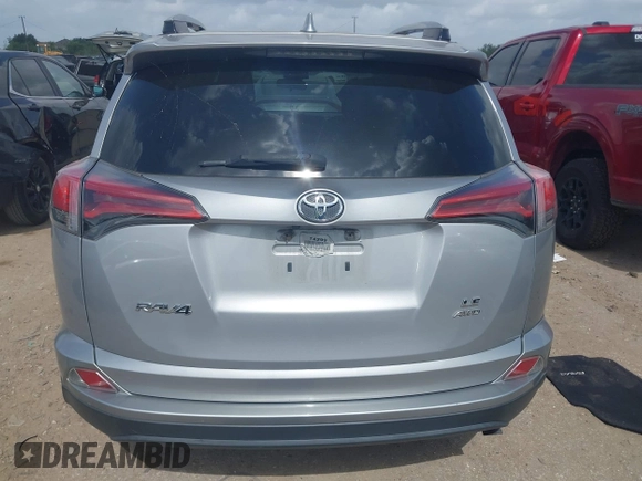 2018 Toyota RAV4 LE with VIN 2T3BFREV8JW758553, listed as a IAAI auction lot 42539300 with 116,337 mi miles and . Bid and sale history available at DreamBid. Image 16.