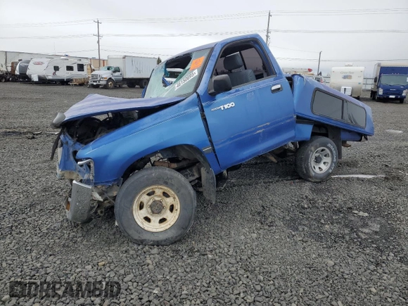 1994 Toyota T100 z VIN JT4VD20A0R0011799, wystawiony jako Copart lot #46150095 z przebiegiem 186 722 mil mil oraz Szkoda całkowita • Salvage title. Historia ofert i sprzedaży dostępna na DreamBid. Obrazek 1.